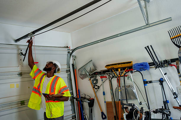 Professional Garage Door Panel Replacement technician working in New York Mills, NY